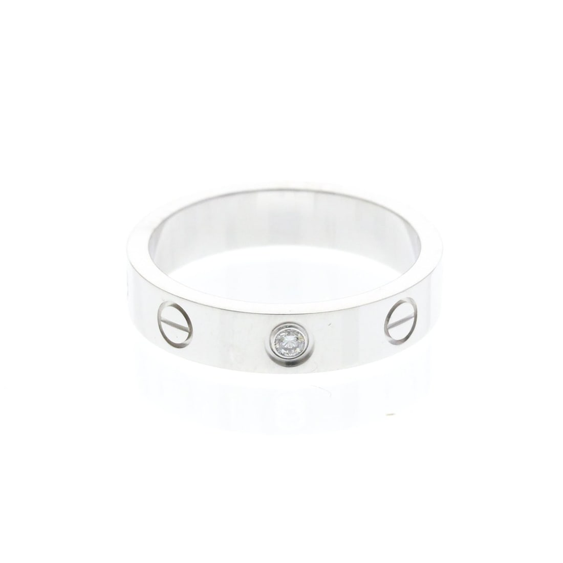 Cartier Mini Love Ring With 1 Diamond White Gold (18K) Fashion Diamond Band Ring Silver: --- Catalog ---Category: SizeWidth: 4mm / 0.16''Weight: 4.7g / 0.16oz.JP Size: 10US Size: 5 1/4Brand Size: 50Category: DesignType: Band ringColor: SilverMetal: White GoldStone: DiamondStyle: FashionGe