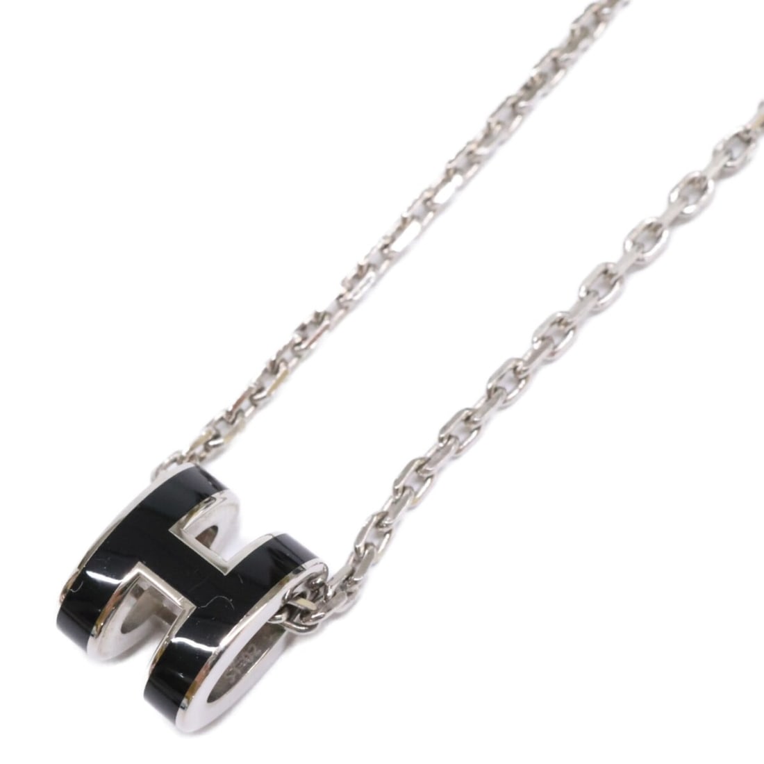 HERMES Pop H Necklace, Black and Silver, for Women: --- Catalog ---Category: SizePendant Size: 9mm x 7mm / 0.35'' x 0.27''Neck Circumference: 40 cm / 15.74''Category: DesignColor: Black, SilverGender: WomenMaterial: MetalNecklace Type: NecklaceCategory