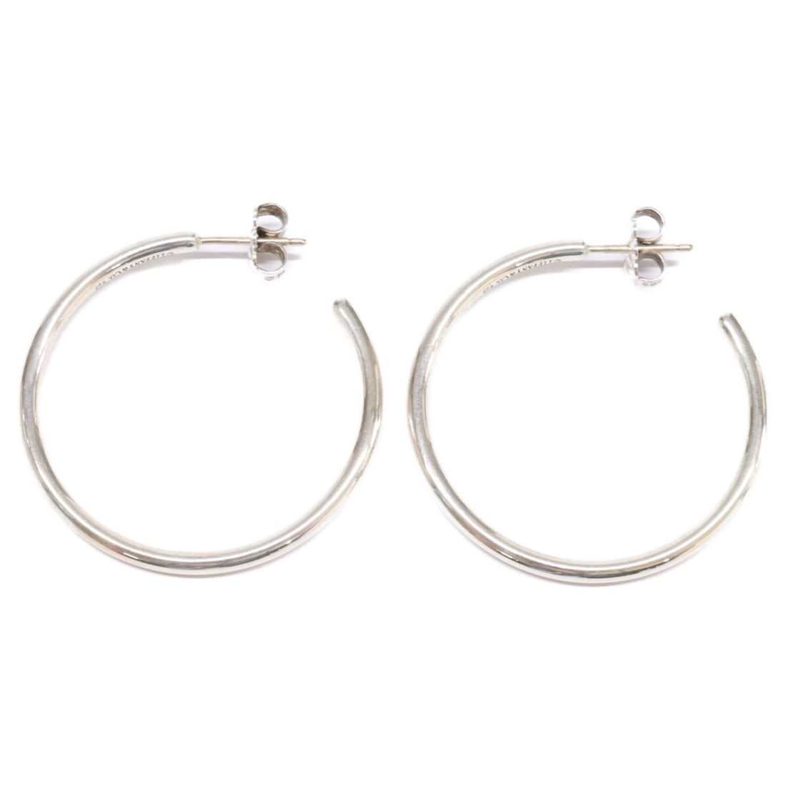 TIFFANY&Co. Tiffany 925 Narrow Hoop Earrings, Silver, Women's: --- Catalog ---Category: SizeSize (HxWxD): 30.00mm x 30.00mm / 1.18'' x 1.18''Category: DesignType: Hoop earringsColor: SilverGender: WomenMaterial: Silver 925Category: GeneralBrand: Tiffany--- Item L