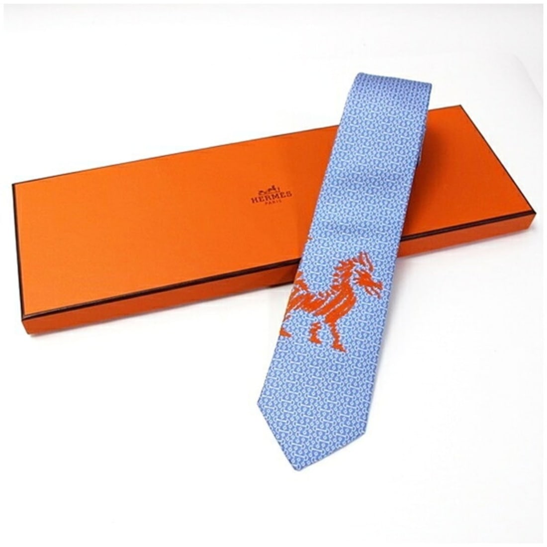 Hermes Silk Tie for Men: --- Catalog ---Category: SizeWidth: 7cm / 2.75''Category: DesignType: CravatColor: Light blue, OrangeGender: Men,WomenMaterial: Silk Category: GeneralBrand: Hermes--- Item List ---Section: ConditionRa