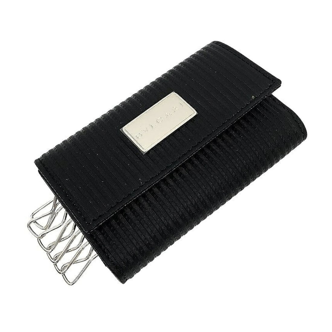 Bulgari BVLGARI Key Case Mirelgue Black 25559: --- Catalog ---Category: DesignType: KeycaseColor: BlackGender: Men,WomenMaterial: Canvas , Leather Category: GeneralBrand: BvlgariCategory: Physical PropertiesSize (HxWxD): 6.5cm x 10.5cm x 2cm /