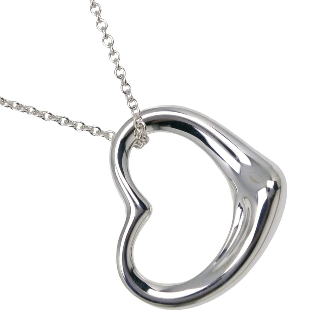 Tiffany & Co. Open Heart Large Necklace, designed by Elsa Peretti, 925 Sterling Silver, approx.: --- Catalog ---Category: SizePendant Size: 23mm x 27mm / 0.9'' x 1.06''Neck Circumference: 46 cm / 18.11''Category: DesignGender: WomenMaterial: Silver 925Necklace Type: NecklaceCategory: GeneralBrand