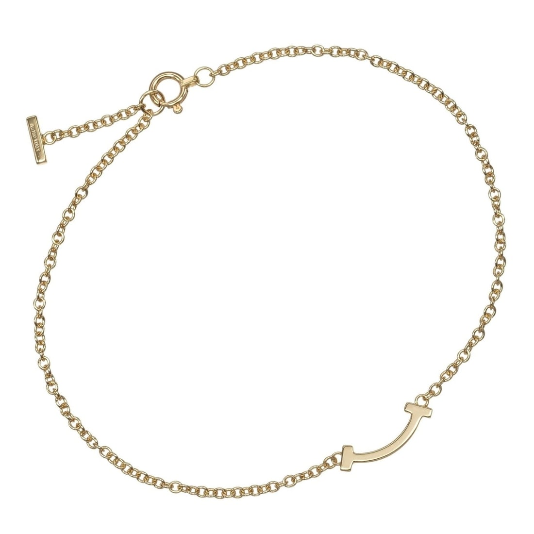 Tiffany & Co. T Smile Mini Bracelet, 18K Yellow Gold, approx. 1.86g.: --- Catalog ---Category: SizeLength: 17.5cm - 18.8cm / 6.88'' - 7.4''Category: DesignType: Charm braceletGender: WomenMaterial: Yellow gold (18K)Category: GeneralBrand: Tiffany--- Item List ---Section
