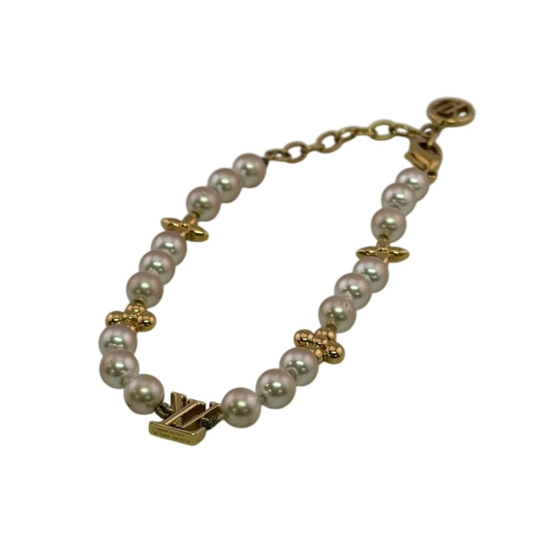 LOUIS VUITTON M1129A Pearl Bracelet White: --- Catalog ---Category: SizeLength: 23cm / 9.05''Category: DesignType: Charm braceletColor: Gold, WhiteGender: WomenMaterial: Gold platingCategory: GeneralMPN: M1129ABrand: Louis Vuitton--- Item List