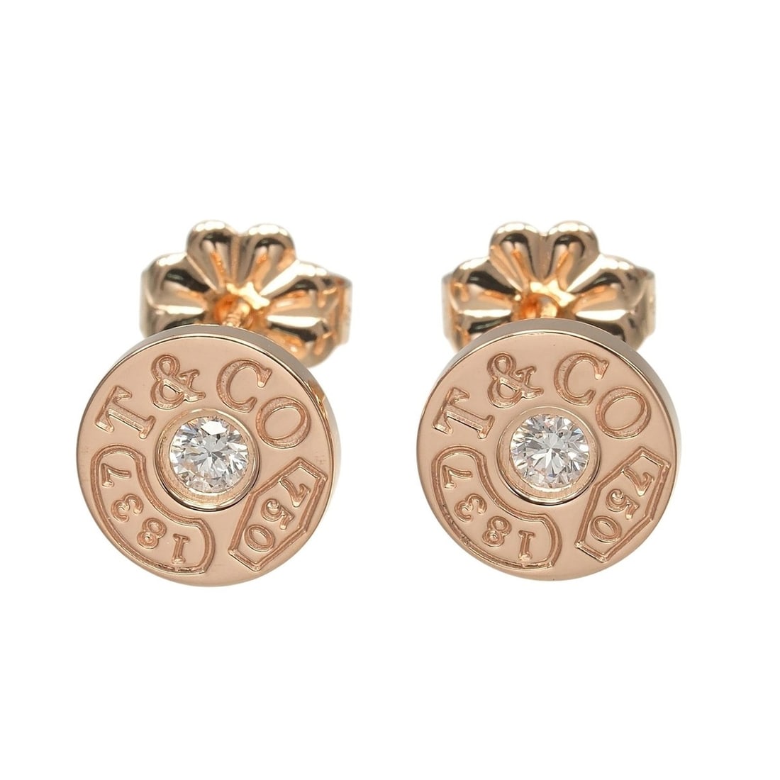 Tiffany & Co. 1837 Circle Earrings, 18K Pink Gold with Diamonds, Approx. 2.51g.: --- Catalog ---Category: SizeSize (HxWxD): 8.20mm x 8.20mm / 0.32'' x 0.32''Category: DesignType: Stud earringsStone: DiamondGender: WomenMaterial: Pink gold (18K)Category: GeneralBrand: Tiffany--- It