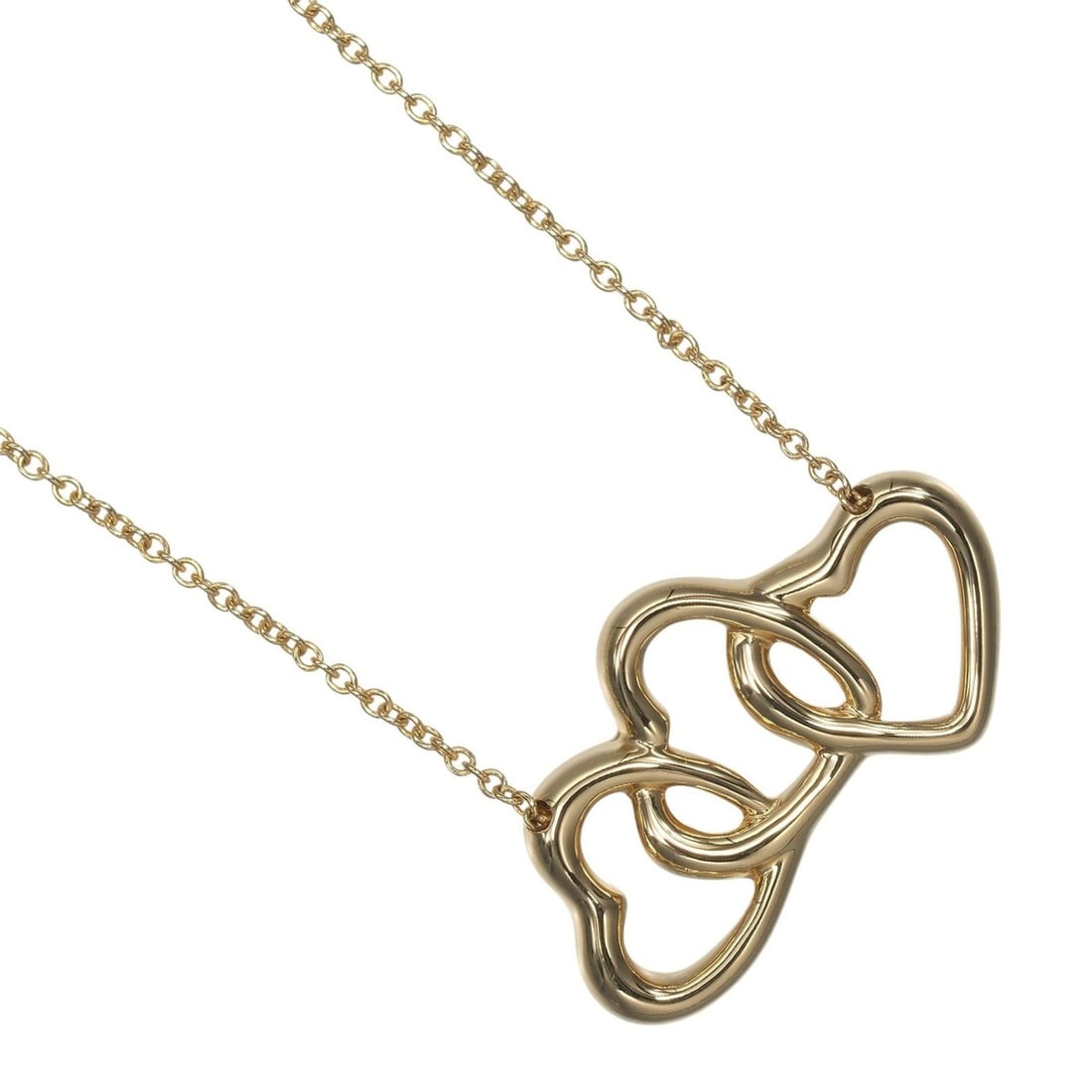Tiffany & Co. Triple Heart Necklace, 18K Yellow Gold, approx. 5.13g.: --- Catalog ---Category: SizePendant Size: 13.5mm x 23.9mm / 0.53'' x 0.94''Neck Circumference: 40 cm / 15.74''Category: DesignGender: WomenMaterial: Yellow gold (18K)Necklace Type: NecklaceCategory: 