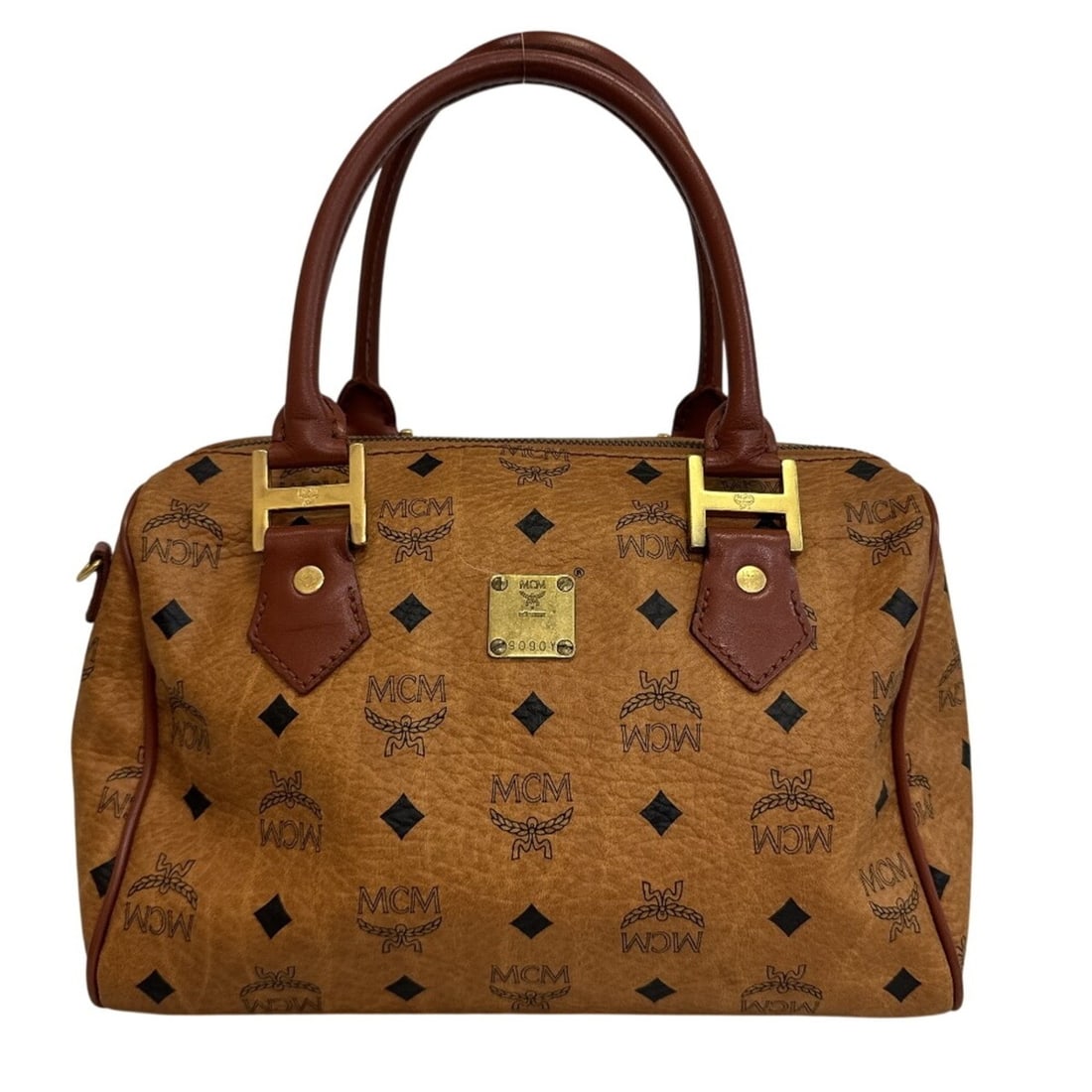 MCM Mini Boston Visetos Handbag Brown: --- Catalog ---Category: SizeSize (HxWxD): 20cm x 27cm x 14cm / 7.87'' x 10.62'' x 5.51''Category: DesignType: HandbagColor: BrownGender: WomenMaterial: PVC Category: GeneralBrand: MCM--- Item List --