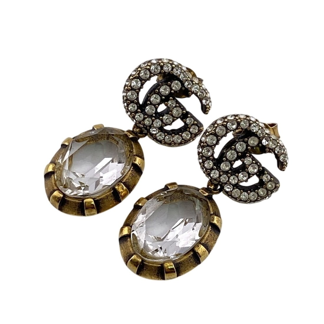 GUCCI Double G Iconic Classic GG Marmont Earrings (Gold): --- Catalog ---Category: SizeSize (HxWxD): 3.30mm x 1.30mm / 0.13'' x 0.05''Category: DesignType: Stud earringsColor: GoldGender: WomenMaterial: Gold plating, RhinestoneCategory: GeneralBrand: Gucci--