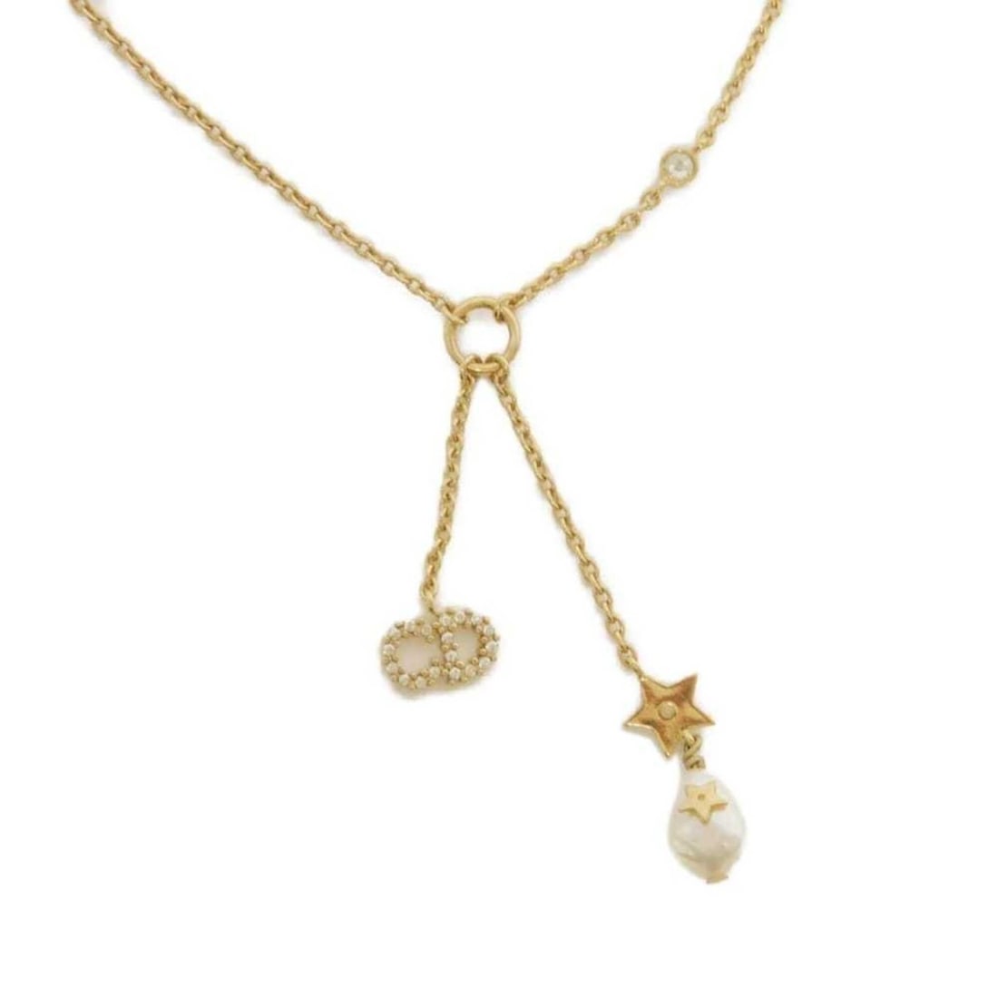 Christian Dior Dior Shiny-D Necklace, Crystal Rhinestone Star Metal Gold CD Logo Resin Pearl Ivory: --- Catalog ---Category: SizePendant Size: 4.5mm x 1mm / 0.17'' x 0.03''Neck Circumference: 42 cm / 16.53''Category: DesignColor: Gold, IvoryGender: WomenMaterial: RhinestoneNecklace Type: NecklaceCat