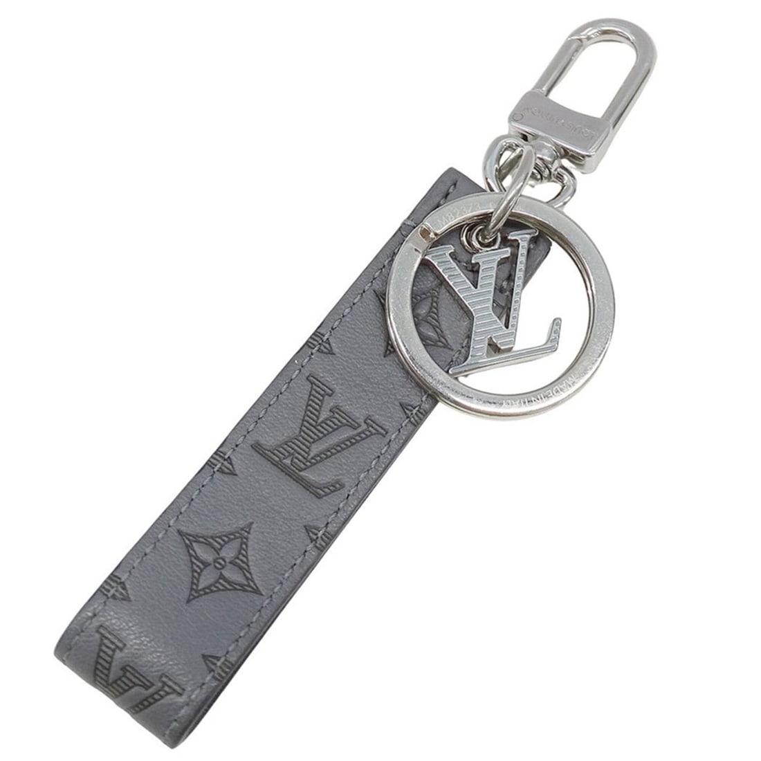 Louis Vuitton LOUIS VUITTON Keychain for Men, Brand Monogram Shadow Leather - Dragonne Grey M82373,: --- Catalog ---Category: SizeSize (HxWxD): 15.5cm x 2.3cm x 1cm / 6.1'' x 0.9'' x 0.39''Category: DesignType: KeyringColor: GrayGender: MenMaterial: LeatherCategory: GeneralMPN: M82373Brand: Louis Vui