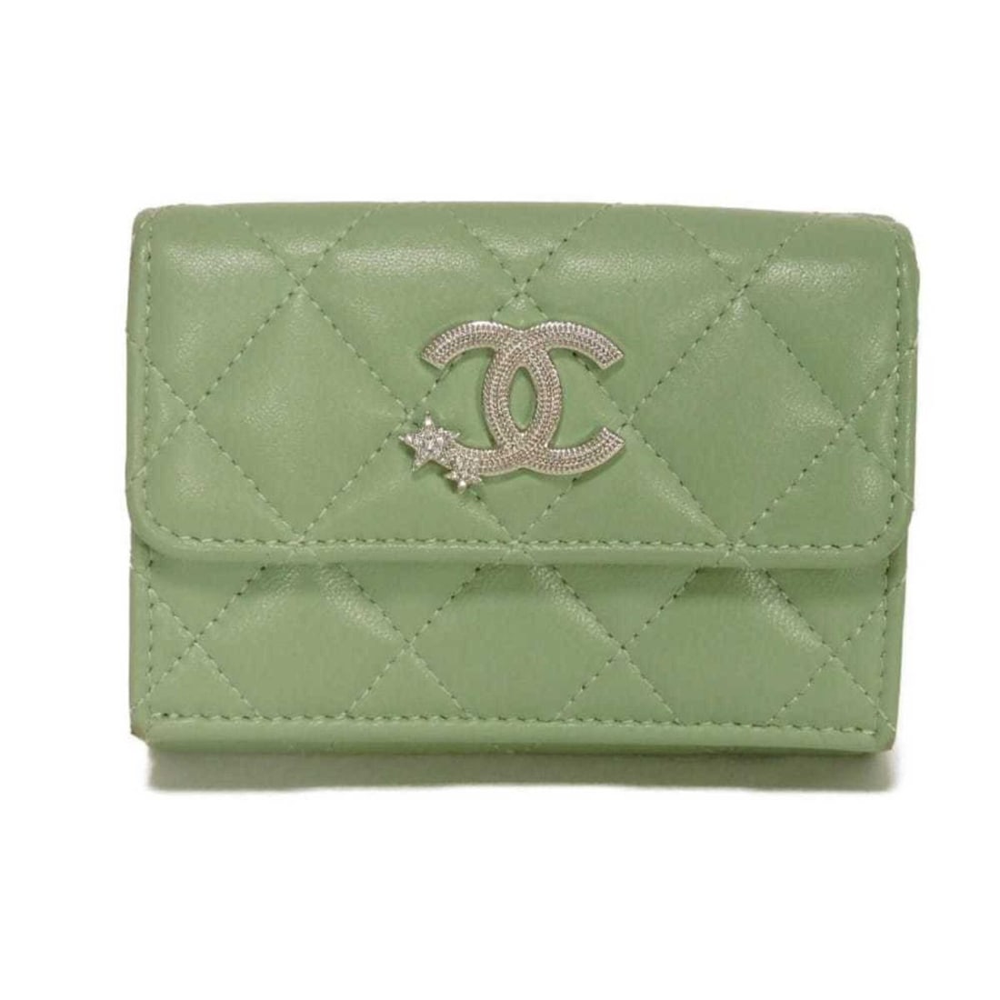Chanel Classic Small Flap Tri-fold Wallet with Star Rhinestones (Random Pattern) in Light Green: --- Catalog ---Category: SizeSize (HxWxD): 7.5cm x 10.5cm x 3.8cm / 2.95'' x 4.13'' x 1.49''Category: DesignType: Wallet (tri-fold)Color: Light greenGender: WomenMaterial: Rhinestone Category: General