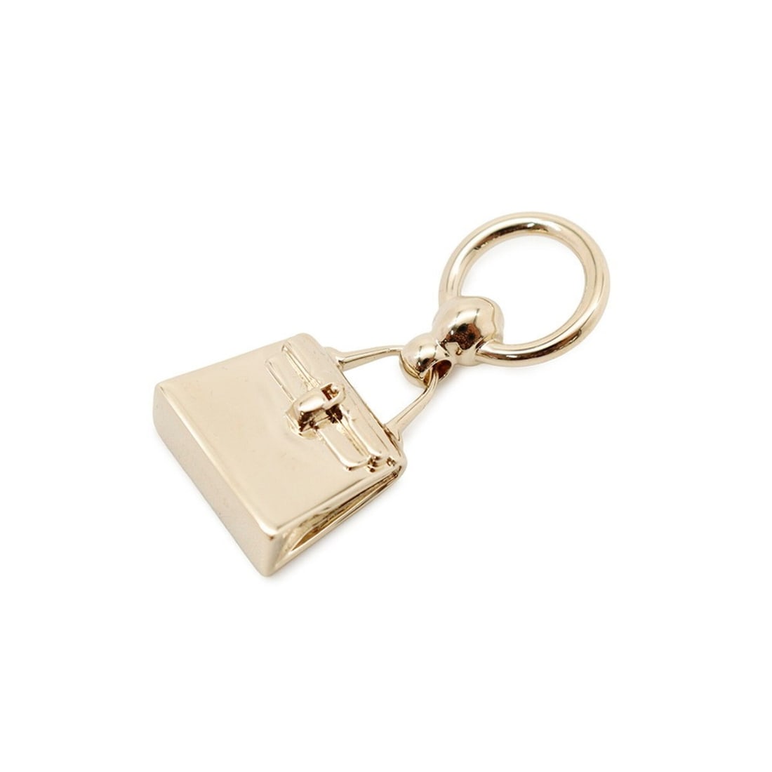Hermes scarf ring, Twilly Mini Kelly, HERMES charm,: --- Catalog ---Category: SizeSize (HxWxD): 21.00mm x 11.00mm / 0.83'' x 0.43''Category: DesignType: Handbag charmColor: Champagne goldGender: WomenMaterial: MetalCategory: GeneralLine: KellyBrand: Her