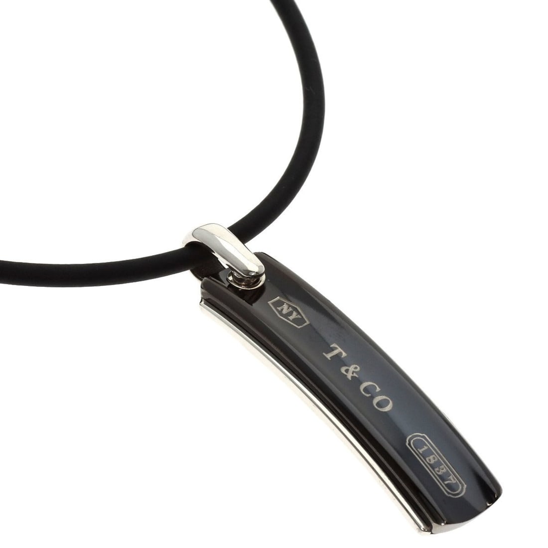 Tiffany & Co. 1837 Necklace, Silver/Titanium, Men's.: --- Catalog ---Category: SizePendant Size: 49mm x 11.9mm / 1.92'' x 0.46''Neck Circumference: 53 cm / 20.86''Category: DesignGender: MenMaterial: Silver, TitaniumNecklace Type: NecklaceCategory: Gener