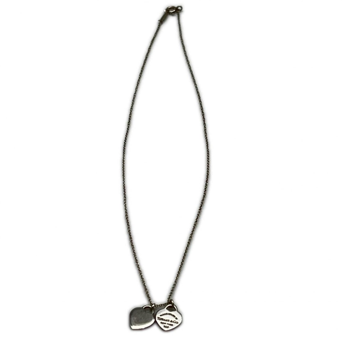 TIFFANY&Co. Return to Mini Double Heart Tag Pendant Ag925 60014069 Necklace for Women: --- Catalog ---Category: SizeWeight: 4g / 0.14oz.Pendant Size: 9mm x 9mm / 0.35'' x 0.35''Neck Circumference: 40.4 cm / 15.9''Category: DesignColor: SilverGender: WomenMaterial: Silver 925Necklace Typ