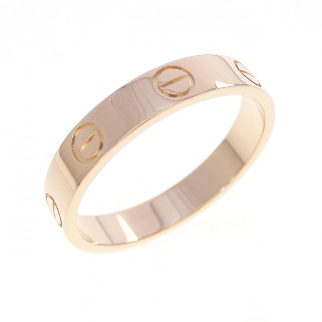 Cartier Mini Love Ring: --- Catalog ---Category: SizeUS Size: 7.5Brand Size: 55Category: DesignType: Band ringGender: WomenMaterial: Pink gold (18K)Category: GeneralMPN: B4085200Brand: Cartier--- Item List ---Section: