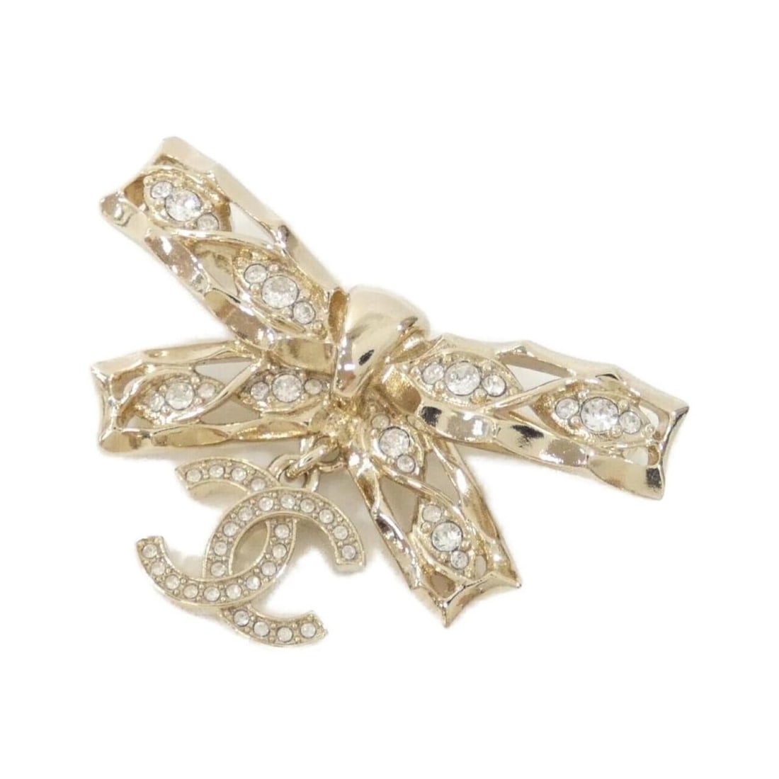 Chanel brooch: --- Catalog ---Category: SizeSize (HxWxD): 3cm x 4.5cm / 1.18'' x 1.77''Category: DesignType: BroochColor: Clear, GoldGender: WomenCategory: GeneralBrand: Chanel--- Item List ---Section: ConditionRank