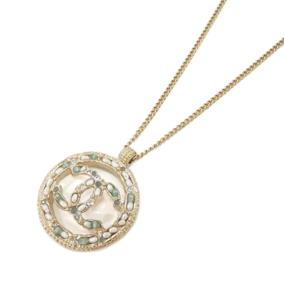 Chanel necklace: --- Catalog ---Category: SizePendant Size: 39mm x 32mm / 1.53'' x 1.25''Neck Circumference: 42 cm - 60 cm / 16.53'' - 23.62''Category: DesignColor: Gold, Green, WhiteGender: WomenNecklace Type: