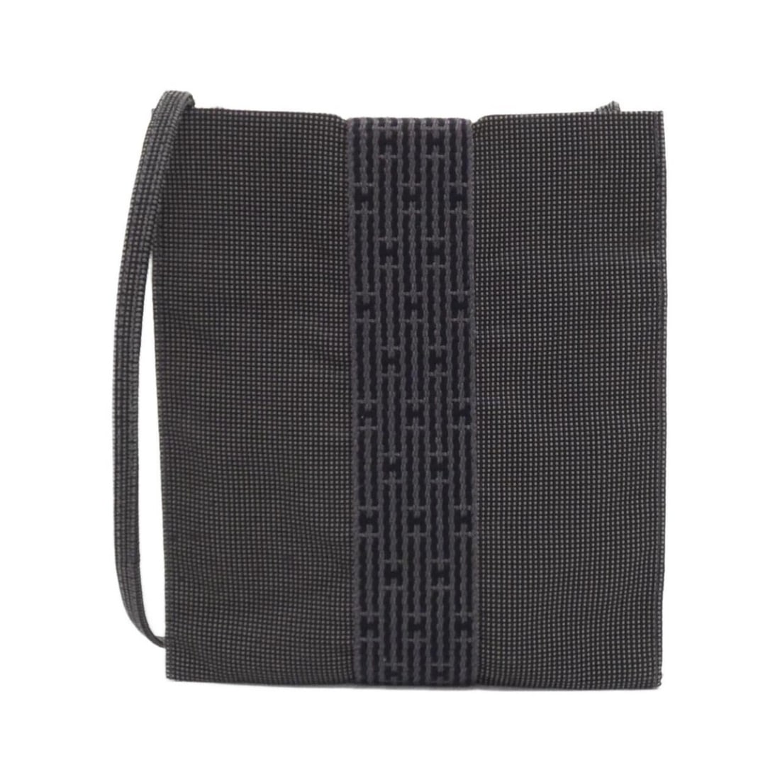 Hermes Herline Pochette 100967M Shoulder Bag: --- Catalog ---Category: SizeSize (HxWxD): 19.5cm x 17cm x 1cm / 7.67'' x 6.69'' x 0.39''Category: DesignType: Pochette, Shoulder bagColor: BlackGender: WomenMaterial: Canvas Category: GeneralMPN: