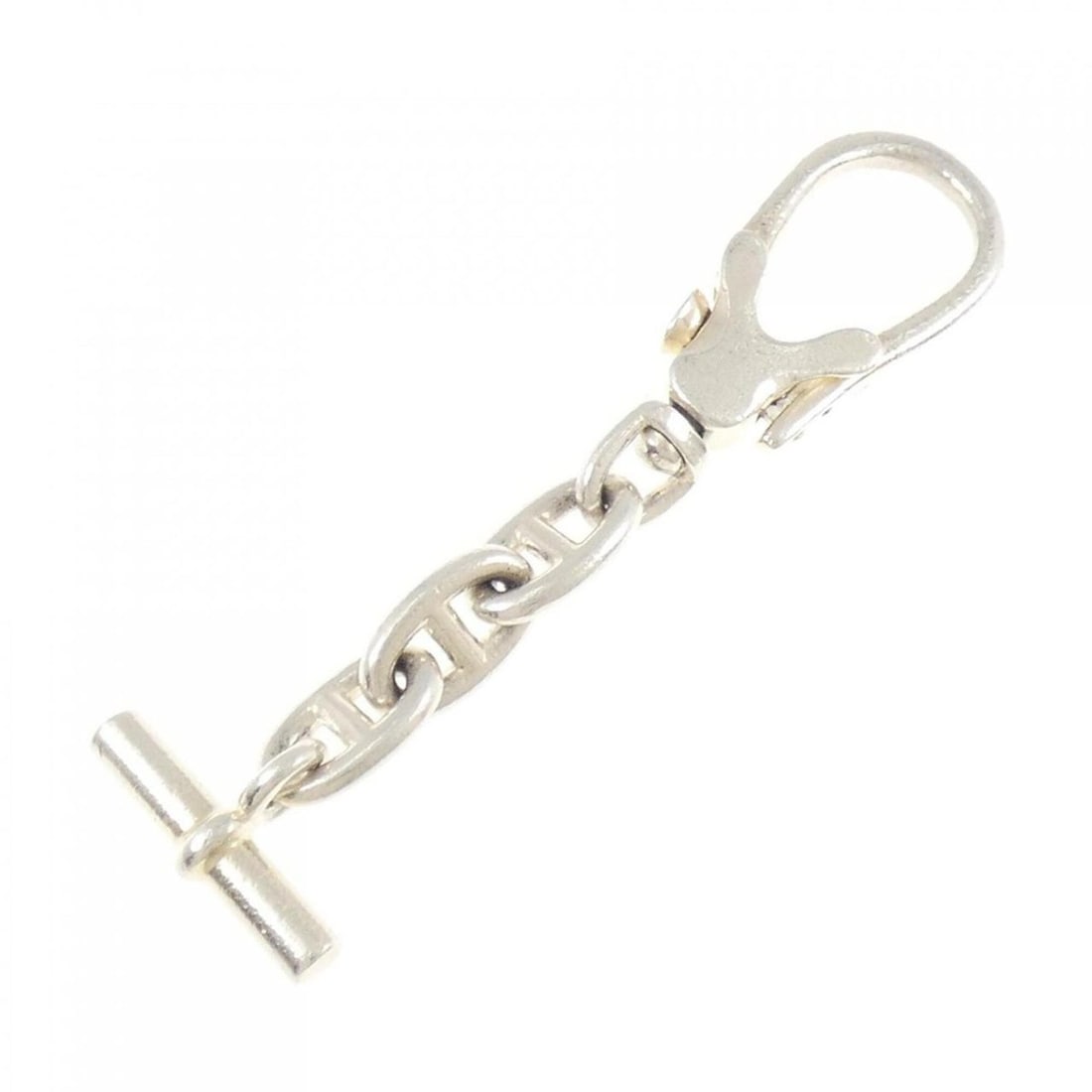 Hermes Hallmark Keyring: --- Catalog ---Category: SizeSize (HxWxD): 8.9cm x 2.52cm / 3.5'' x 0.99''Category: DesignType: KeyringColor: SilverGender: WomenCategory: GeneralBrand: Hermes--- Item List ---Section: