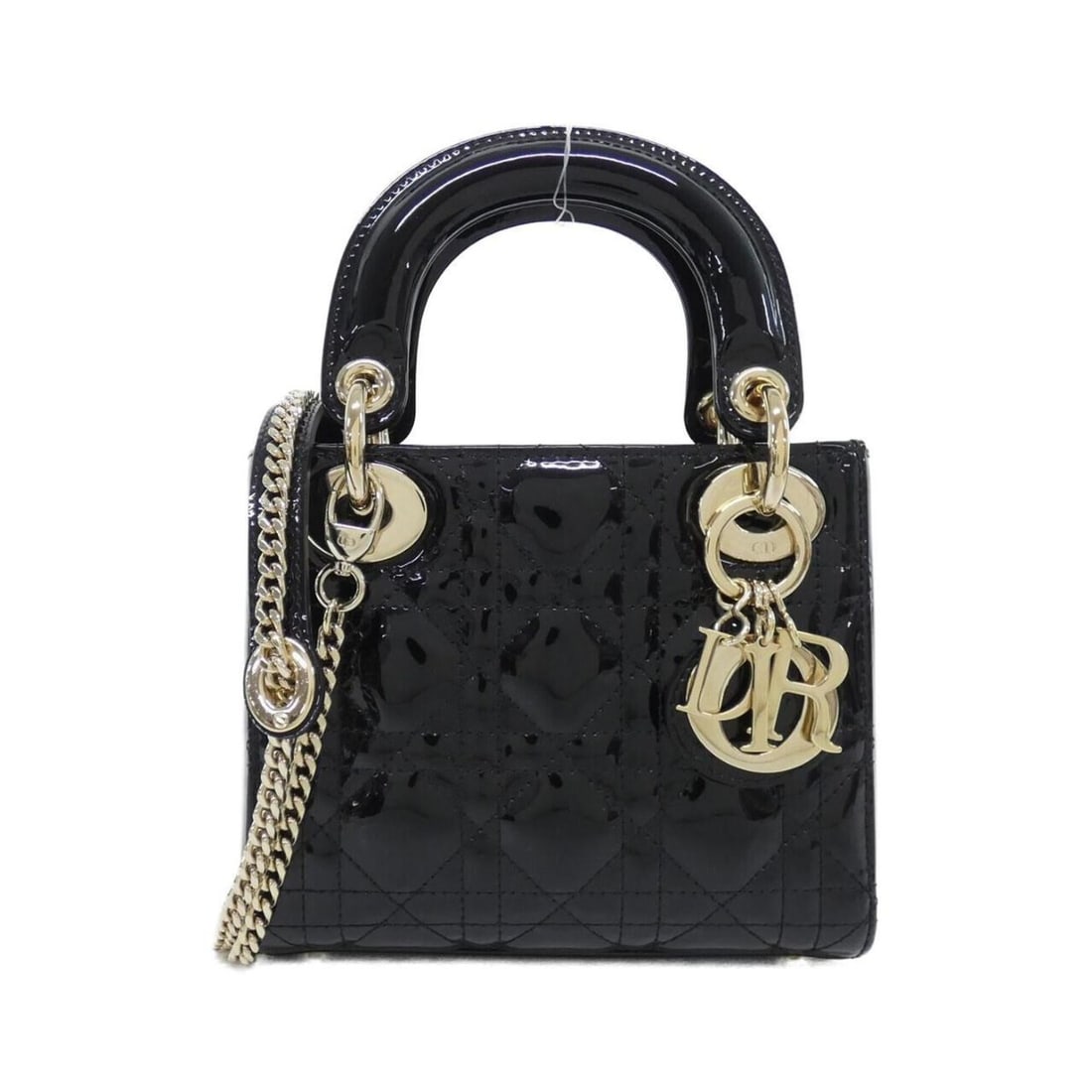 Christian Dior Lady Mini M0505OVRB Handbag: --- Catalog ---Category: SizeSize (HxWxD): 14cm x 17cm x 7cm / 5.51'' x 6.69'' x 2.75''Category: DesignType: HandbagColor: BlackGender: WomenHardware Color: GoldCategory: GeneralMPN: M0505OVRBBrand: C