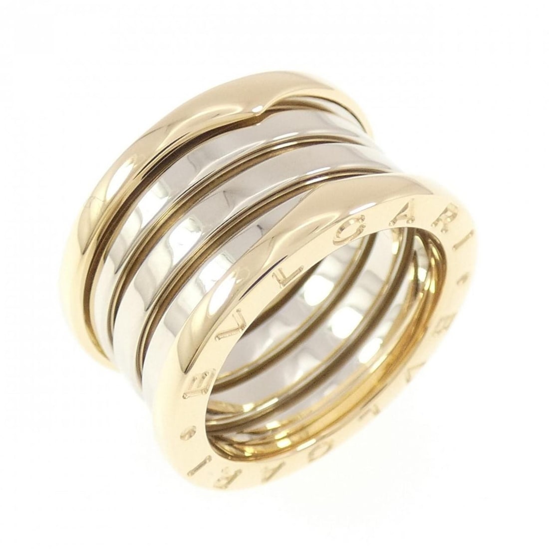 Bvlgari Bulgari B.zero1 Ring: --- Catalog ---Category: SizeUS Size: 5.5Brand Size: 50Category: DesignType: Band ringGender: WomenMaterial: White gold (18K), Yellow gold (18K)Category: GeneralBrand: Bvlgari--- Item List ---Section: