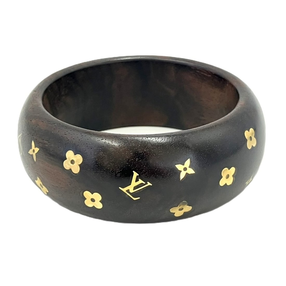 Louis Vuitton Bracelet Sylvania Wood Bangle Brown M65939 LOUIS VUITTON: --- Catalog ---Category: SizeWidth: 3cm / 1.18''Length: 20cm / 7.87''Diameter: 6.5cm / 2.55''Category: DesignType: BangleColor: BrownGender: WomenMaterial: Brass, WoodCategory: GeneralBrand: Louis Vui