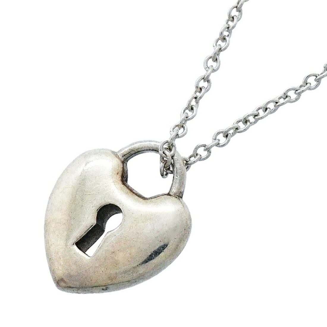 Tiffany & Co. Heart Lock Necklace, Sterling Silver 925, Women's: --- Catalog ---Category: SizePendant Size: 11.1mm x 9.2mm / 0.43'' x 0.36''Neck Circumference: 41 cm / 16.14''Category: DesignGender: WomenMaterial: Silver 925Necklace Type: NecklaceCategory: GeneralB