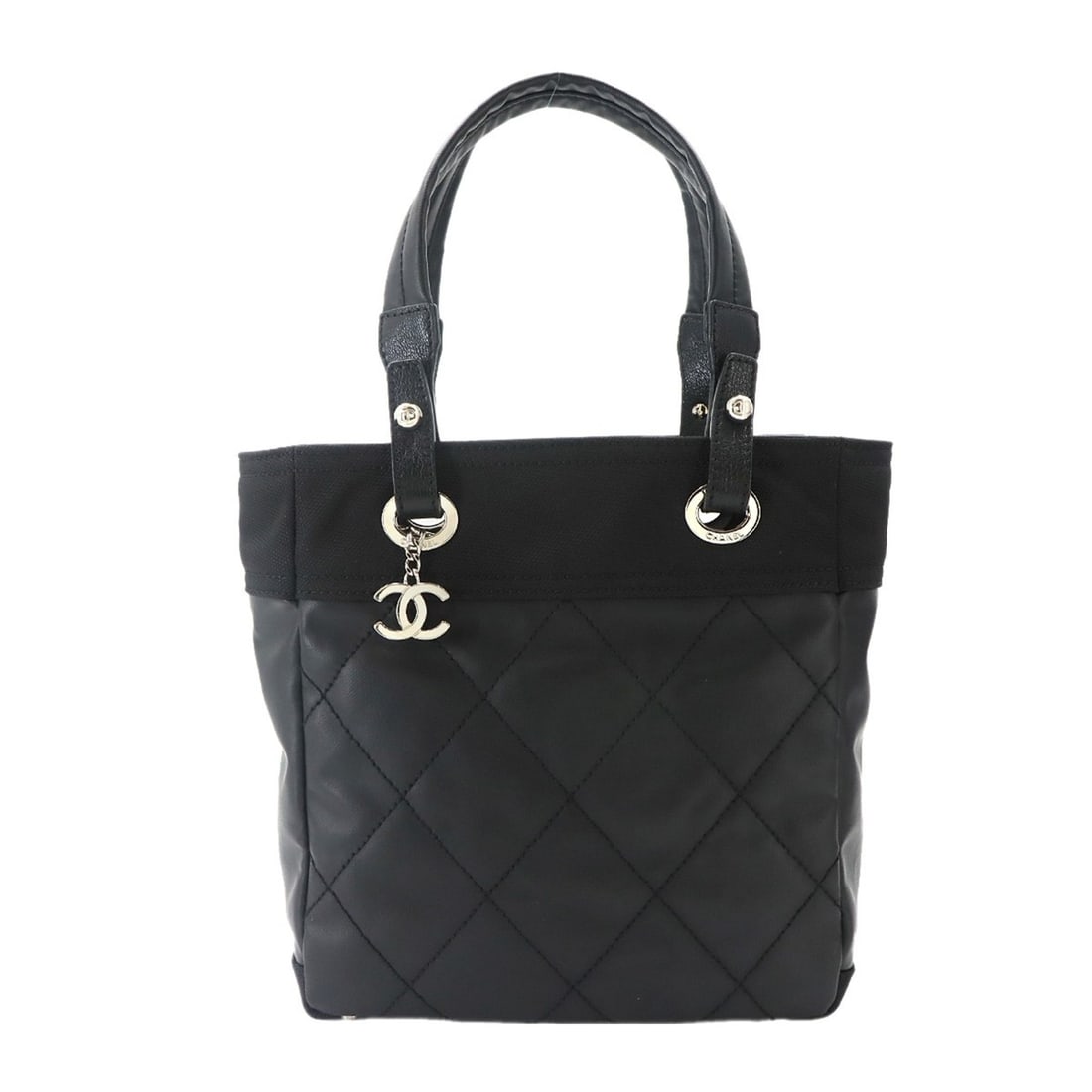 Chanel Paris Biarritz PM Tote Handbag, Nylon and Leather, Black, A34208, Silver Hardware: --- Catalog ---Category: SizeSize (HxWxD): 27cm x 26cm x 11cm / 10.62'' x 10.23'' x 4.33''Category: DesignType: Handbag, Tote bagColor: BlackGender: WomenMaterial: Nylon , Leather , PVC Category: Gene