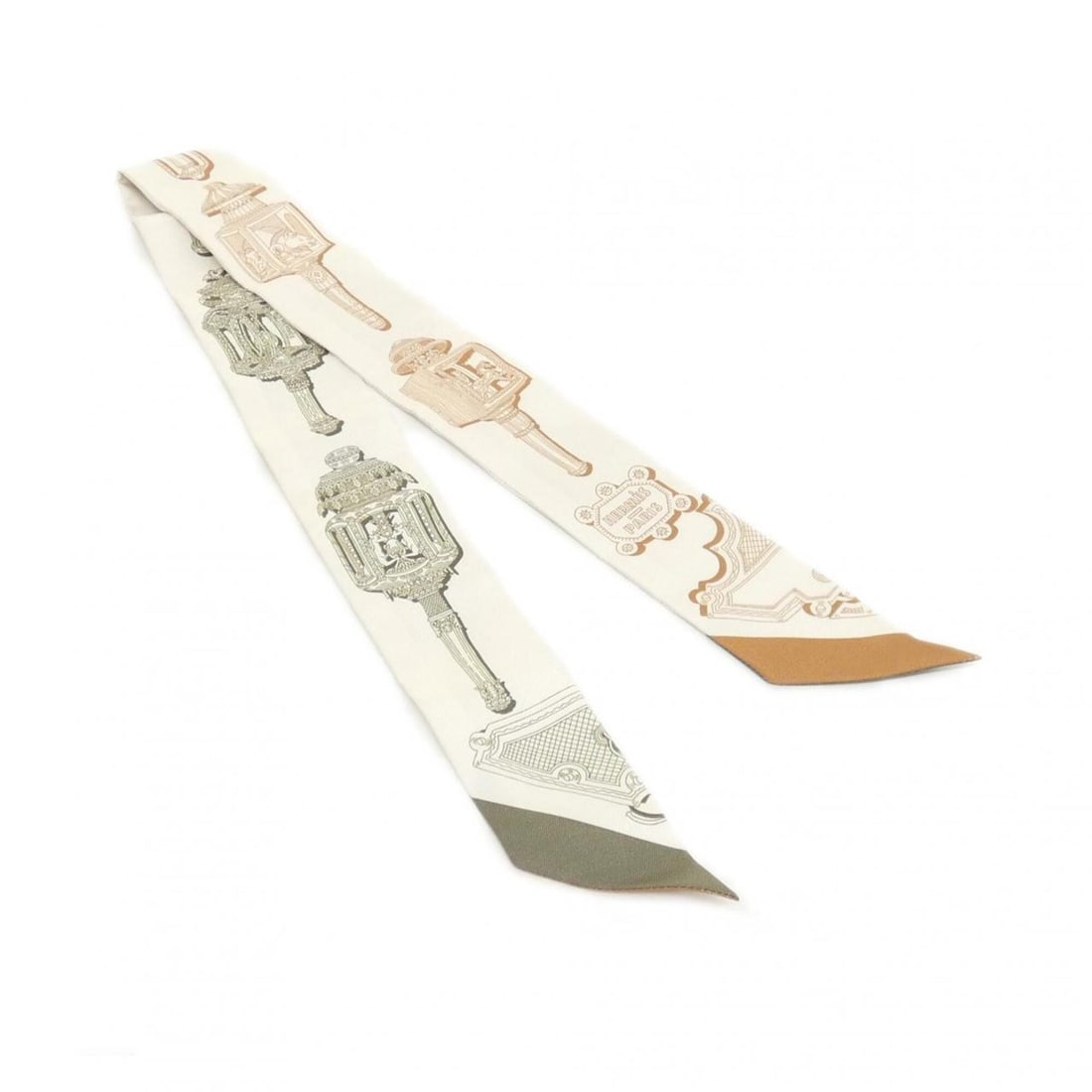 Hermes MERVEILLEUSES LANTERNES Twilly 063081S Scarf Muffler: --- Catalog ---Category: SizeSize (LxW): 5cm x 86cm / 1.96'' x 33.85''Category: DesignType: ScarfColor: BeigeGender: Men,WomenMaterial: Silk Category: GeneralMPN: 063081SBrand: Hermes--- Item List ---