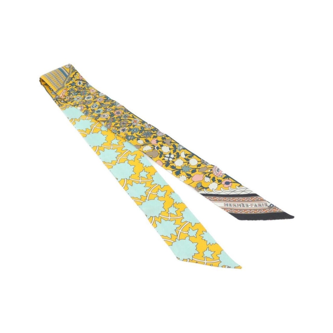 Hermes Tapis Persans Twilly Scarf Muffler: --- Catalog ---Category: SizeSize (LxW): 5cm x 86cm / 1.96'' x 33.85''Category: DesignType: ScarfColor: YellowGender: Men,WomenMaterial: Silk Category: GeneralBrand: Hermes--- Item List ---Section: Co