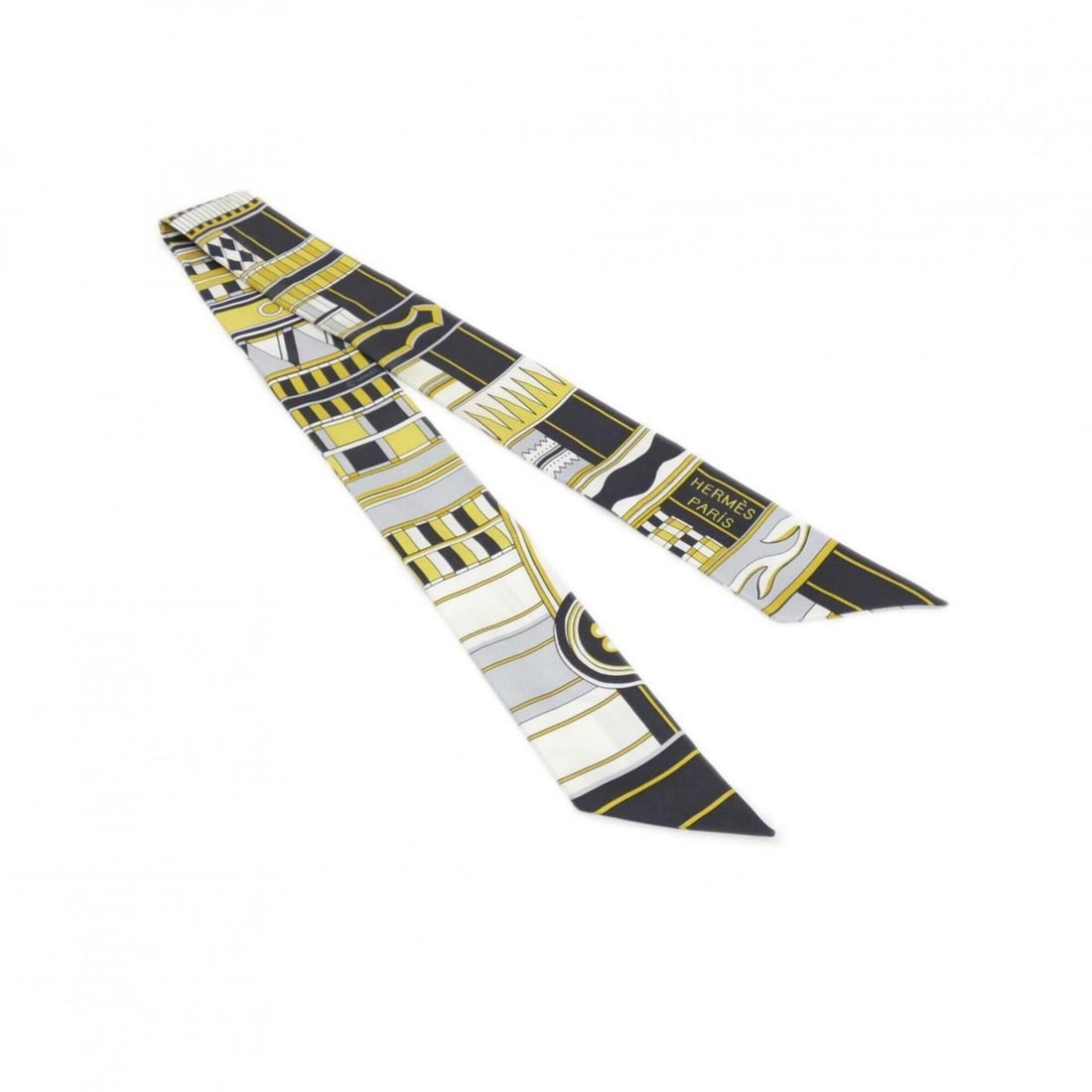Hermes VOLTES ET PIROUETTES Twilly 063516S Scarf Muffler: --- Catalog ---Category: SizeSize (LxW): 5cm x 86cm / 1.96'' x 33.85''Category: DesignType: ScarfColor: Black, Gold, WhiteGender: MenMaterial: Silk Category: GeneralMPN: 063516SBrand: Hermes--- Item L