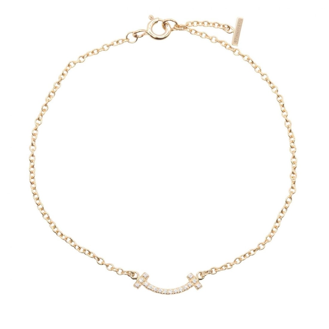 Tiffany & Co. T Smile Mini Diamond Bracelet - 18K Pink Gold (PG) Women's Tone Clear: --- Catalog ---Category: SizeLength: 16cm / 6.29''Category: DesignType: Charm braceletColor: Clear, GoldGender: WomenMaterial: Pink gold (18K)Category: GeneralBrand: Tiffany--- Item List ---Section: C