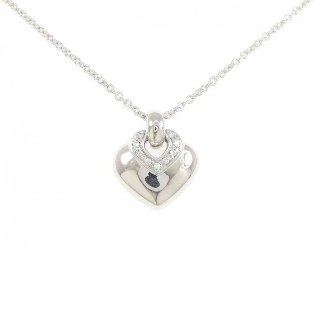 Bvlgari Doppio Cuore Necklace: --- Catalog ---Category: SizePendant Size: 19.4mm x 17.3mm / 0.76'' x 0.68''Neck Circumference: 40 cm / 15.74''Category: DesignGender: WomenMaterial: White gold (18K)Pendant Type: PendantNecklace Type