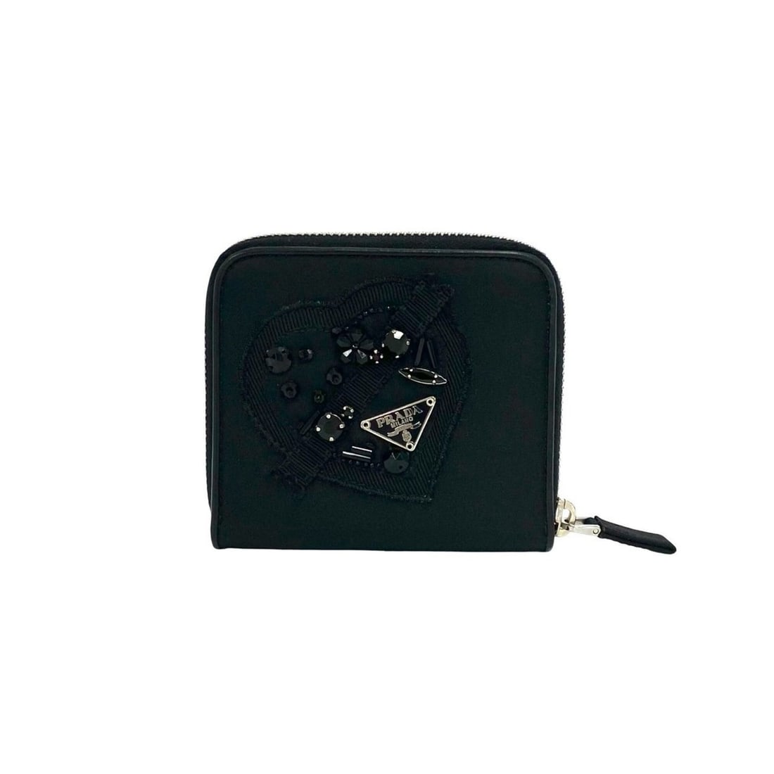 PRADA Triangle Logo Metal Fitting Nylon Bi-fold Wallet Mini Business Card Holder/Card Case Black: --- Catalog ---Category: SizeSize (HxWxD): 9.5cm x 10.5cm x 2.5cm / 3.74'' x 4.13'' x 0.98''Category: DesignType: Wallet (bi-fold)Color: BlackGender: WomenMaterial: Nylon Category: GeneralBrand: Prada