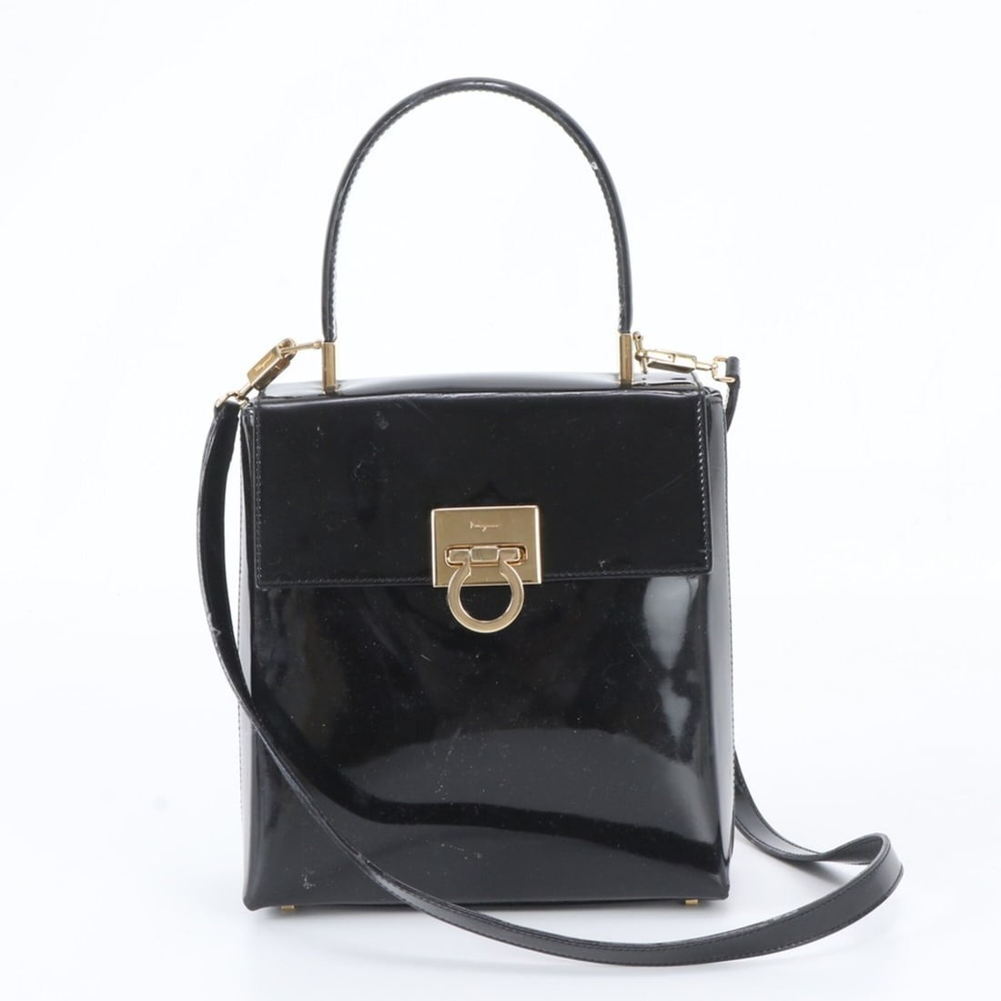 Salvatore Ferragamo Gancini Leather 2-Way Shoulder Bag, Crossbody Handbag, Tote Bag for Women: --- Catalog ---Category: SizeSize (HxWxD): 21cm x 19cm x 6cm / 8.26'' x 7.48'' x 2.36''Strap Length: 92cm / 36.22''Handle Length: 30cm / 11.81''Category: DesignType: Handbag, Shoulder bagColor: BlackG