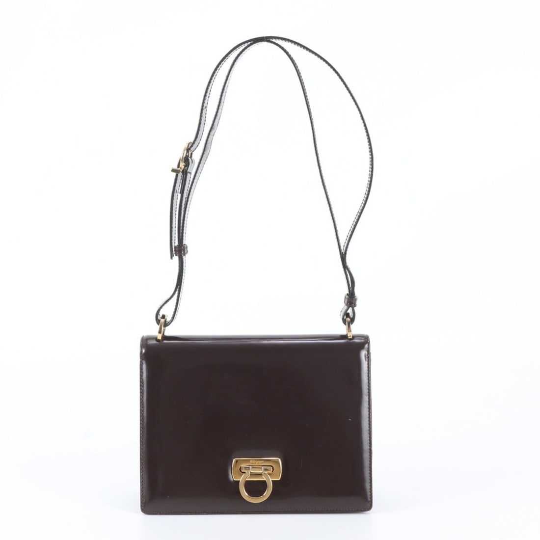 Salvatore Ferragamo Gancini Leather Shoulder Bag, One-Shoulder Tote Bag for Women: --- Catalog ---Category: SizeSize (HxWxD): 15cm x 20cm x 8cm / 5.9'' x 7.87'' x 3.14''Strap Length: 60cm / 23.62''Category: DesignType: Shoulder bag, Tote bagColor: BrownGender: WomenMaterial: Leather