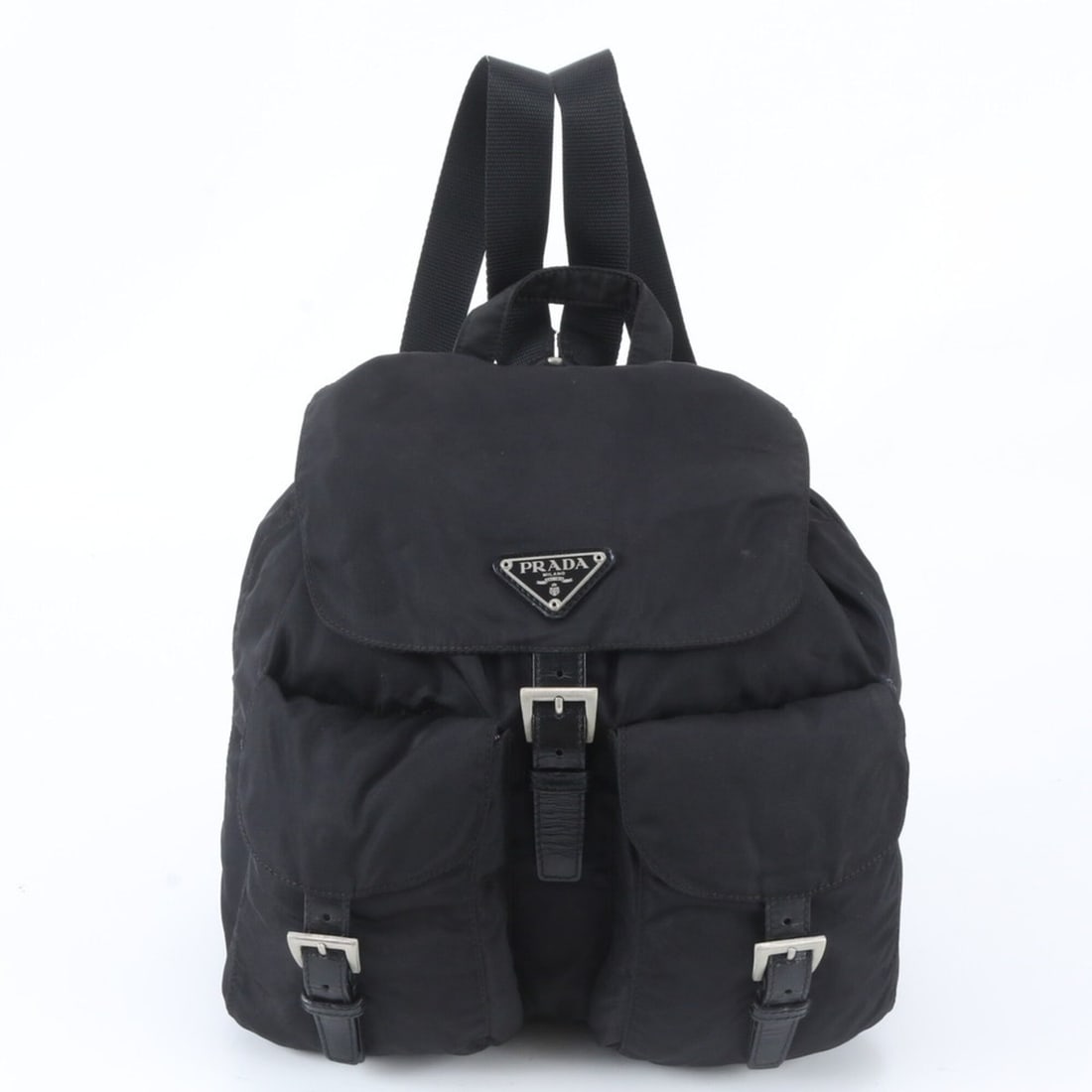 Prada Tessuto Nylon Triangle Logo Leather Backpack Handbag Black Women's: --- Catalog ---Category: SizeSize (HxWxD): 25cm x 31cm x 13cm / 9.84'' x 12.2'' x 5.11''Category: DesignType: BackpackColor: BlackGender: WomenMaterial: Nylon , Leather Category: GeneralBrand: PradaCo