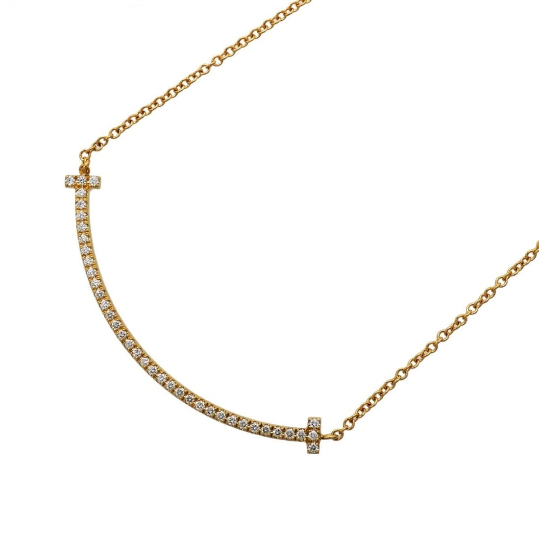 Tiffany & Co. T Smile Small Necklace, 18K Yellow Gold, Diamond, Women's: --- Catalog ---Category: SizePendant Size: 10mm x 36.9mm / 0.39'' x 1.45''Neck Circumference: 40.5 cm / 15.94''Category: DesignStone: DiamondGender: WomenMaterial: Yellow gold (18K)Necklace Type: Neck
