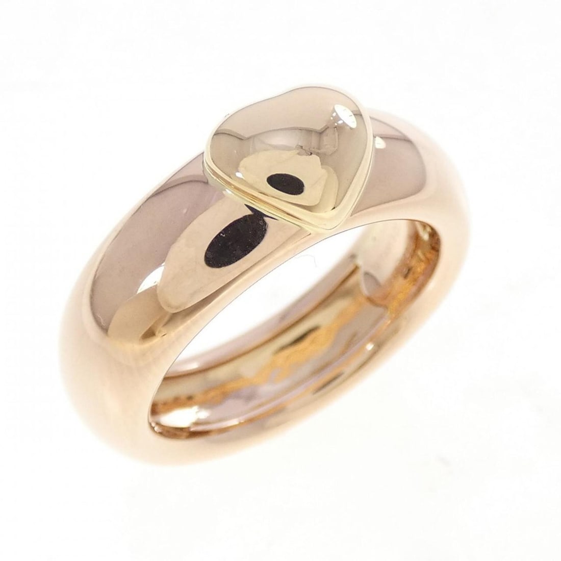 Tiffany Heart Ring: --- Catalog ---Category: SizeJP Size: 11US Size: 6Category: DesignType: Band ringGender: WomenMaterial: Pink gold (18K), Yellow gold (18K)Category: GeneralBrand: Tiffany--- Item List ---Section: Condi