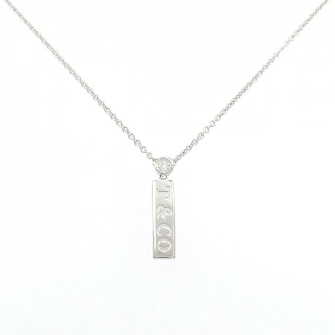 Tiffany & Co. Bar Drop Necklace: --- Catalog ---Category: SizePendant Size: 21.8mm x 4.9mm / 0.85'' x 0.19''Neck Circumference: 41 cm / 16.14''Category: DesignGender: WomenMaterial: White gold (18K)Pendant Type: PendantNecklace