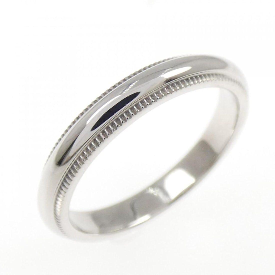 Tiffany & Co. Milgrain Ring: --- Catalog ---Category: SizeJP Size: 10US Size: 5.5Category: DesignType: Band ringGender: WomenMaterial: Platinum 950Category: GeneralBrand: Tiffany--- Item List ---Section: ConditionRanking: Rank SA