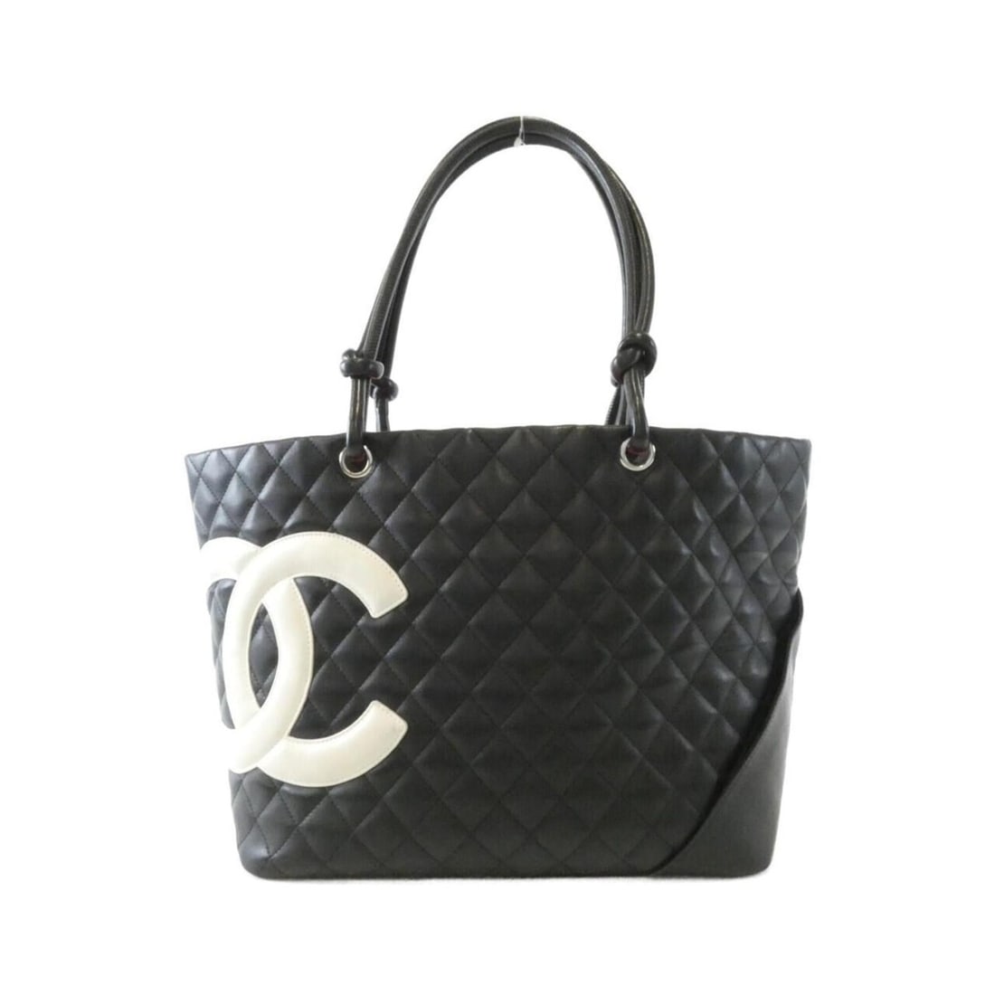 Chanel Cambon Line 25169 Handbag: --- Catalog ---Category: SizeSize (HxWxD): 24cm x 30cm x 14cm / 9.44'' x 11.81'' x 5.51''Category: DesignType: HandbagColor: Black, WhiteGender: WomenMaterial: Leather Hardware Color: