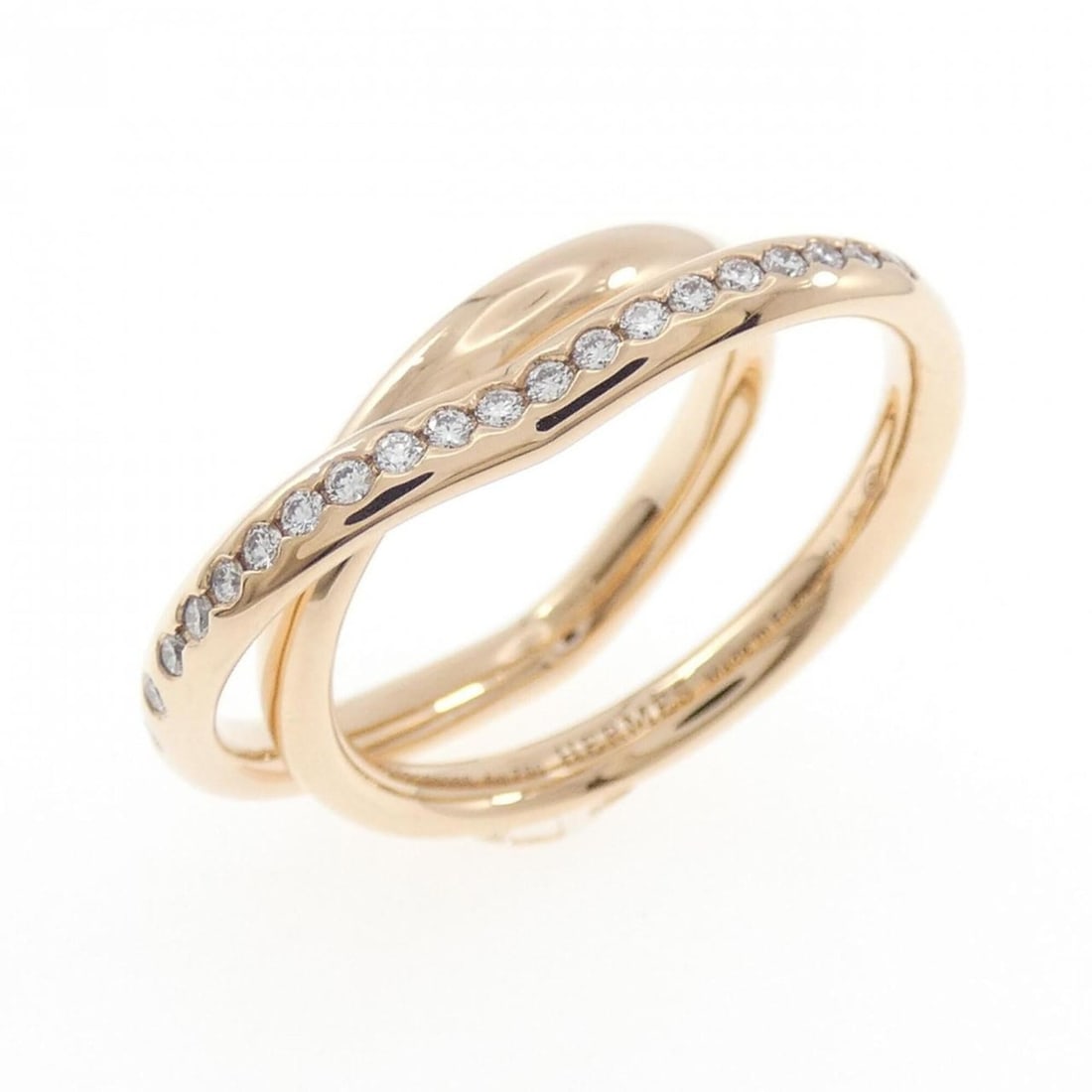 Hermes Hermès Vertige Coeur Ring: --- Catalog ---Category: SizeUS Size: 5.5Brand Size: 50Category: DesignType: Band ringGender: WomenMaterial: Pink gold (18K)Category: GeneralBrand: Hermes--- Item List ---Section: ConditionRanking: Ra