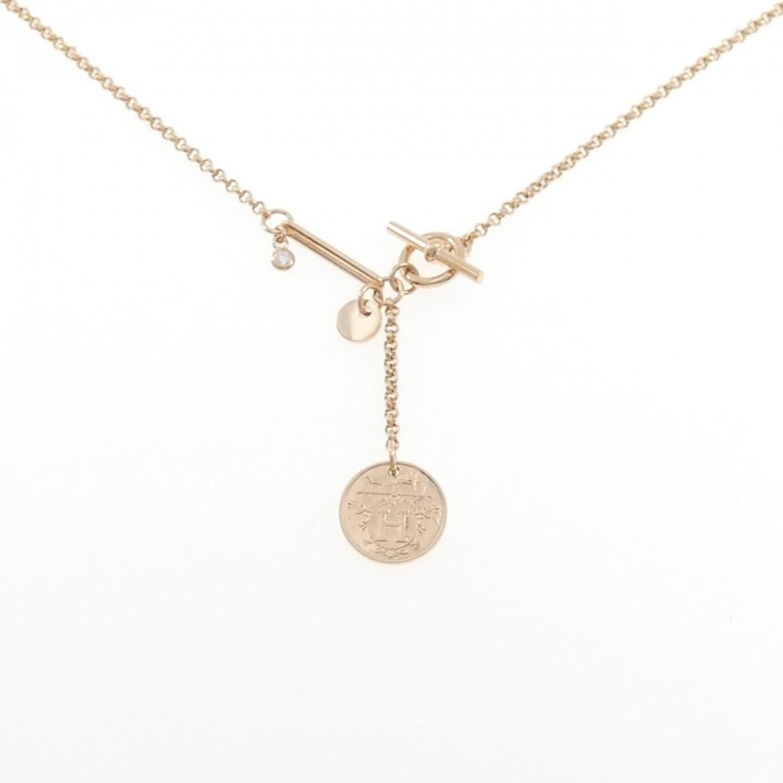 Hermes Hermès Ex-Libris Necklace: --- Catalog ---Category: SizePendant Size: 48mm x 13mm / 1.88'' x 0.51''Neck Circumference: 41 cm / 16.14''Category: DesignStone: DiamondGender: WomenMaterial: Pink gold (18K)Pendant Type: PendantNeck