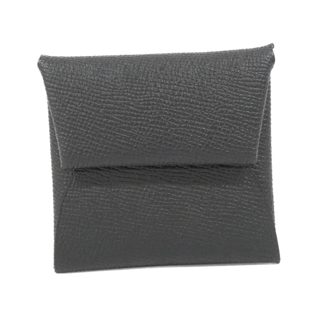 Hermes Bastia 041054CK Wallet/Coin Case: --- Catalog ---Category: SizeSize (HxWxD): 8cm x 8.5cm x 1cm / 3.14'' x 3.34'' x 0.39''Category: DesignType: Coin purse/coin caseColor: BlackGender: Women,MenMaterial: Epsom leather Category: GeneralM