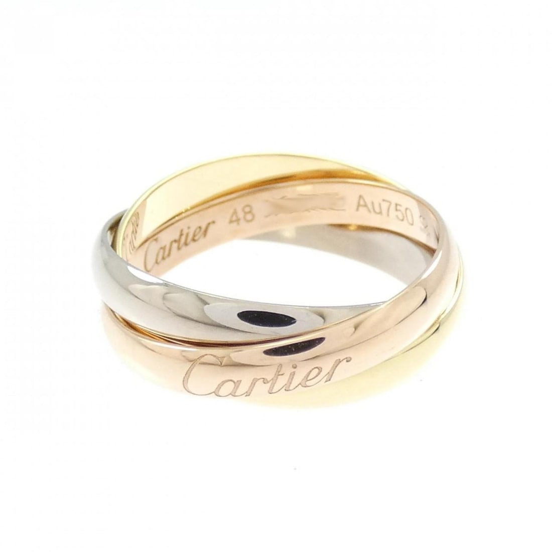 Cartier Trinity Ring: --- Catalog ---Category: SizeUS Size: 4.5Brand Size: 48Category: DesignType: Band ringGender: WomenMaterial: Pink gold (18K), White gold (18K), Yellow gold (18K)Category: GeneralMPN: B4086100Brand: