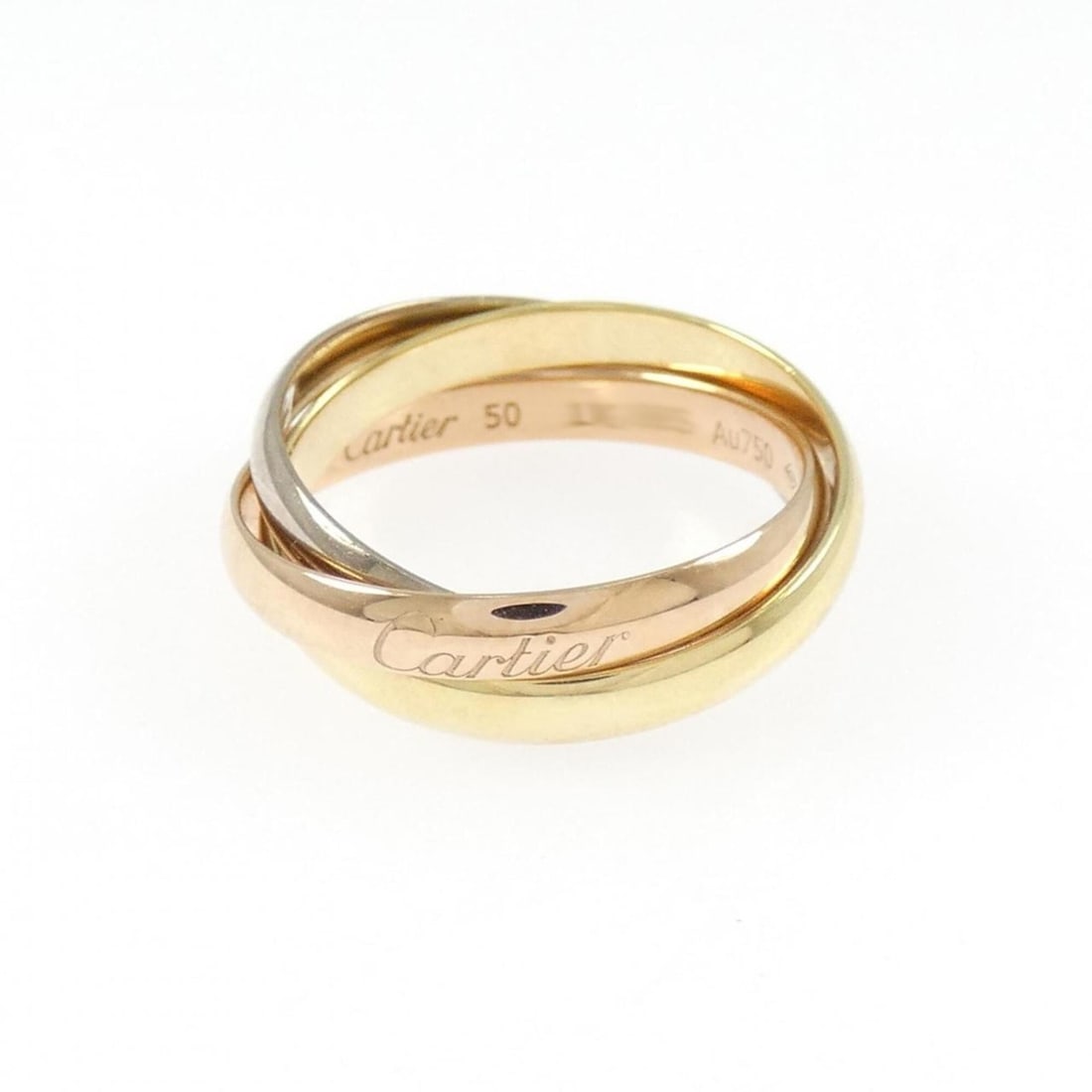 Cartier Trinity Ring: --- Catalog ---Category: SizeUS Size: 5.5Brand Size: 50Category: DesignType: Band ringGender: WomenMaterial: Pink gold (18K), White gold (18K), Yellow gold (18K)Category: GeneralMPN: B4086100Brand: