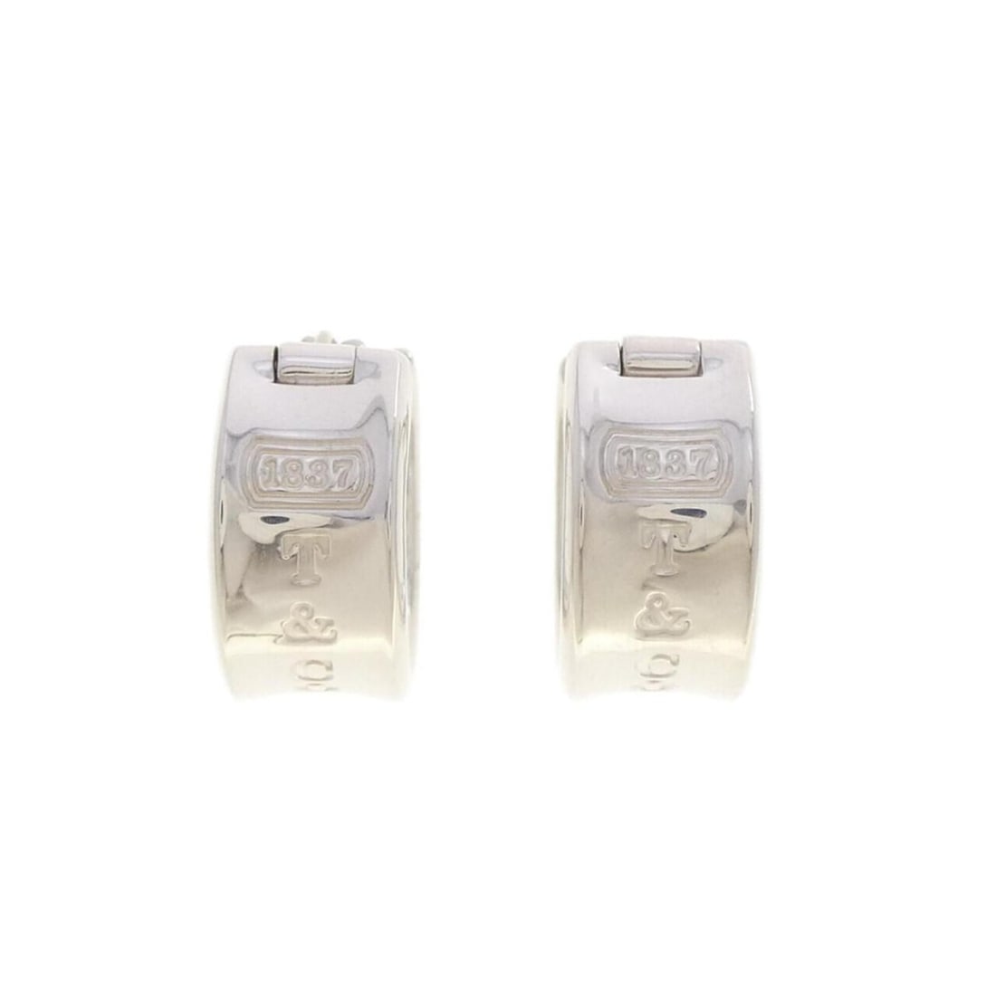 Tiffany & Co. 1837 Earrings: --- Catalog ---Category: SizeWeight: 15.2g / 0.53oz.Size (HxWxD): 18.40mm x 9.50mm / 0.72'' x 0.37''Category: DesignType: Clip earringsGender: WomenMaterial: Silver 925Category: GeneralBrand:
