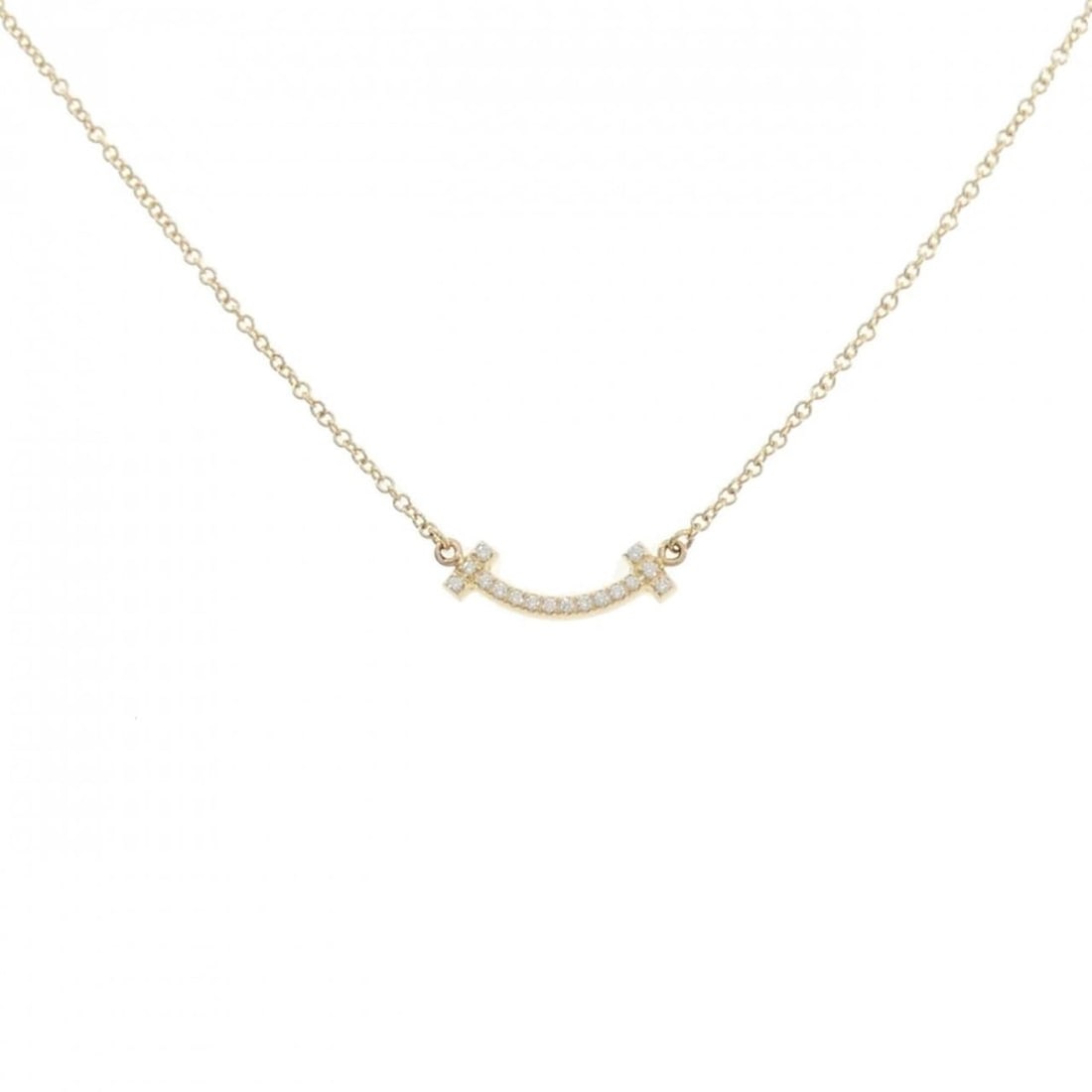 Tiffany T Smile Mini Necklace: --- Catalog ---Category: SizeWidth: 1mm / 0.04''Weight: 2.3g / 0.08oz.Pendant Size: 3.7mm x 13.5mm / 0.14'' x 0.53''Neck Circumference: 40 cm - 45 cm / 15.74'' - 17.71''Category: DesignStone: