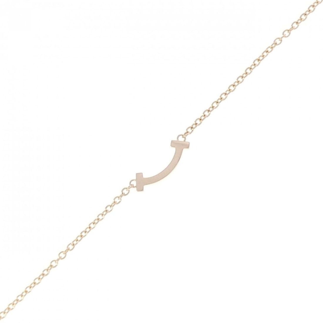 Tiffany T Smile Mini Bracelet: --- Catalog ---Category: SizeWidth: 4.6mm / 0.18''Weight: 1.7g / 0.05oz.Total Length: 15cm / 5.9''Category: DesignType: Charm braceletGender: WomenMaterial: Pink gold (18K)Category: GeneralLine: